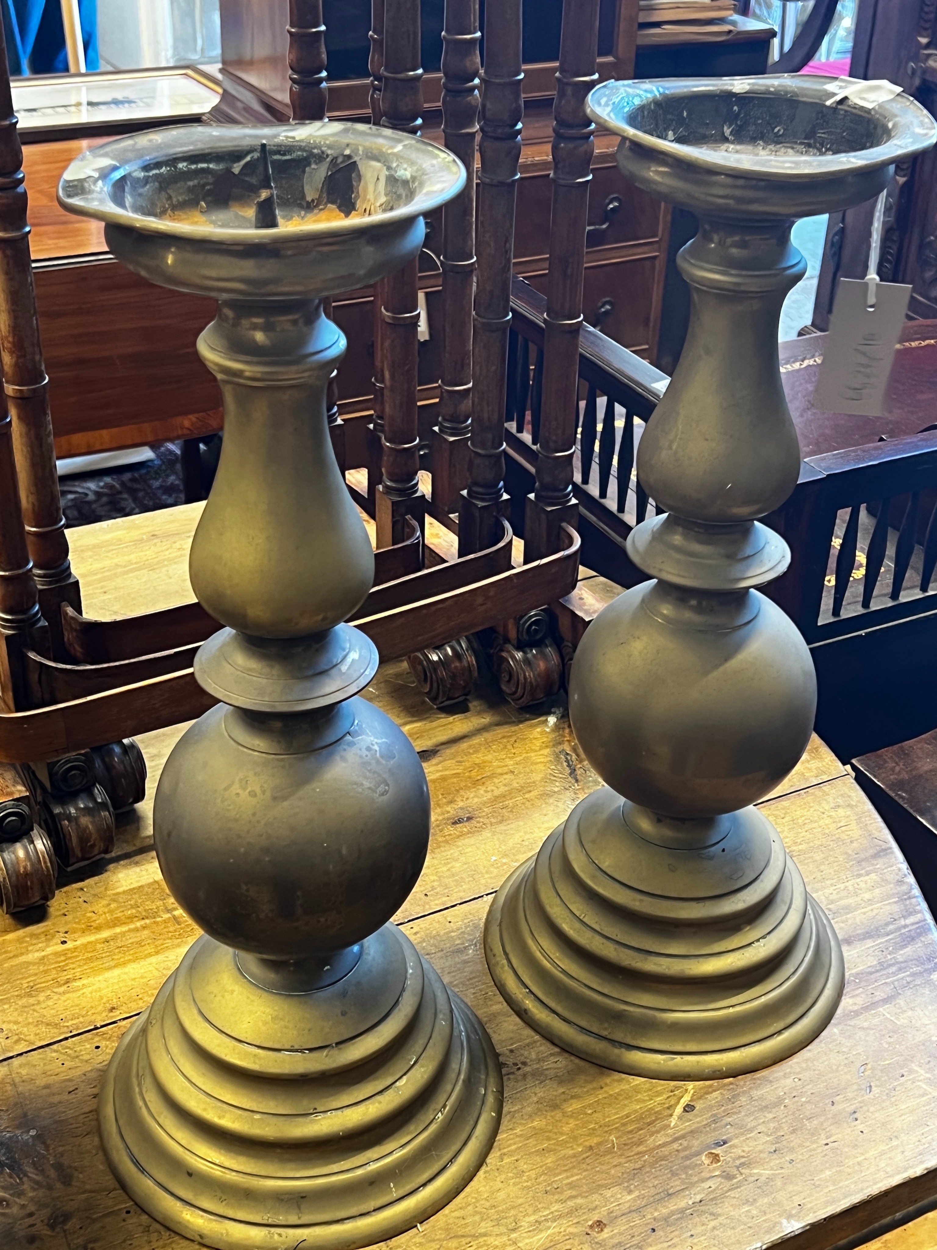 A pair of Victorian style brass pricket candlesticks, height 50cm